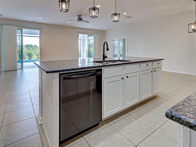 9157 Genesee St, Port Charlotte, FL 33981 - kitchen featuring dishwasher, ceiling fan, dark stone countertops, white cabinetry, and recessed lighting