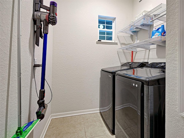 9157 Genesee St, Port Charlotte, FL 33981 - laundry room with separate washer and dryer and tile patterned floors