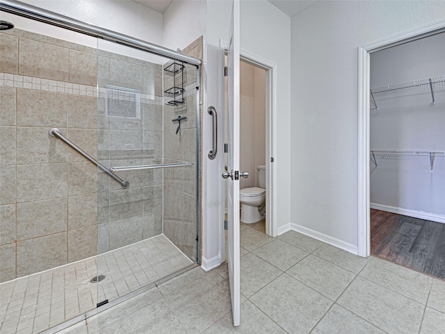 9157 Genesee St, Port Charlotte, FL 33981 - full bath featuring a stall shower, tile patterned floors, and a spacious closet