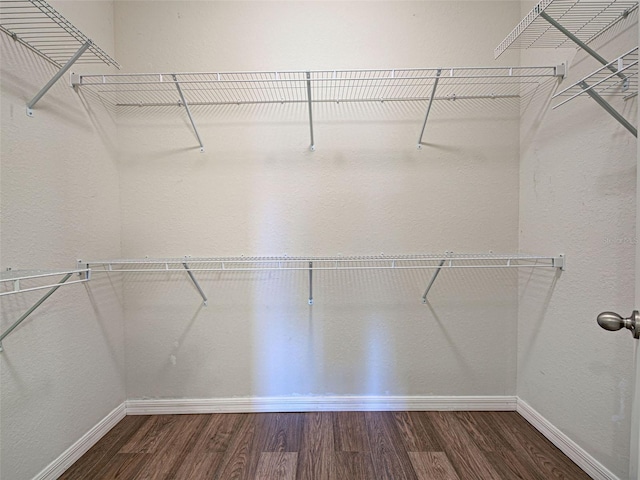 9157 Genesee St, Port Charlotte, FL 33981 - spacious closet featuring wood finished floors