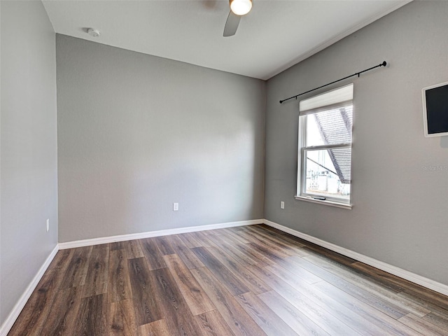 9157 Genesee St, Port Charlotte, FL 33981 - unfurnished room featuring a ceiling fan, wood finished floors, and a smoke detector