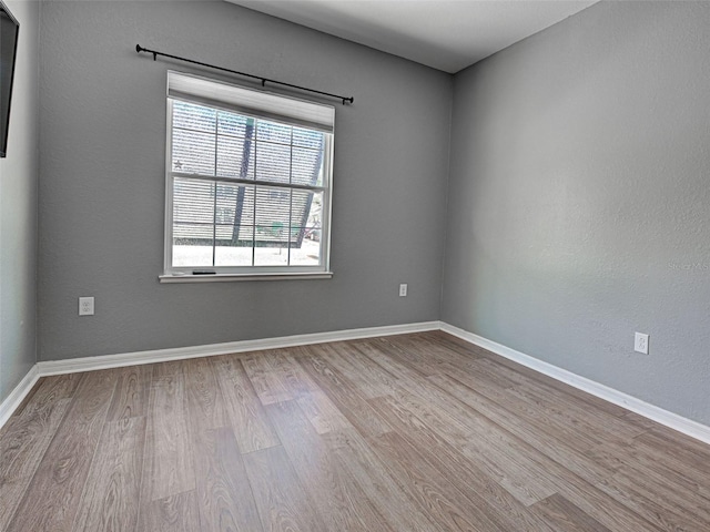 9157 Genesee St, Port Charlotte, FL 33981 - spare room with wood finished floors