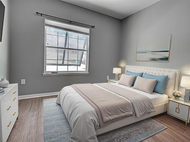 9157 Genesee St, Port Charlotte, FL 33981 - bedroom with wood finished floors and baseboards