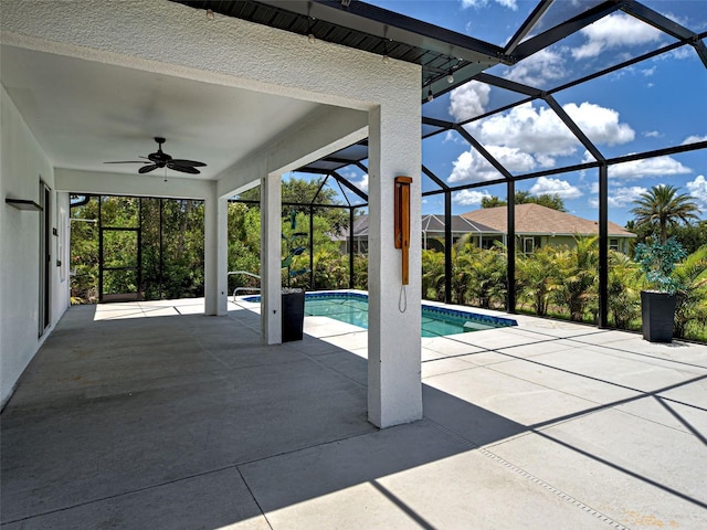 9157 Genesee St, Port Charlotte, FL 33981 - outdoor pool with ceiling fan, a patio, and glass enclosure