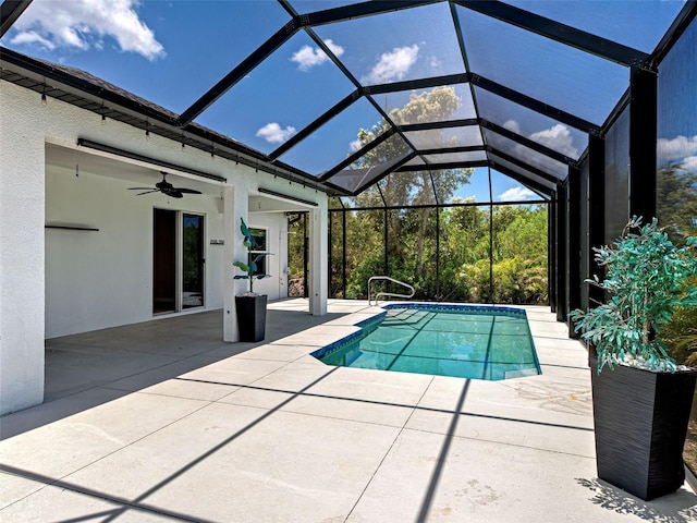 9157 Genesee St, Port Charlotte, FL 33981 - outdoor pool with a patio, a ceiling fan, and glass enclosure
