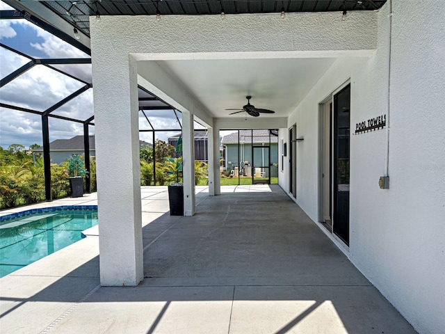 9157 Genesee St, Port Charlotte, FL 33981 - view of patio / terrace featuring ceiling fan, an outdoor pool, and a lanai