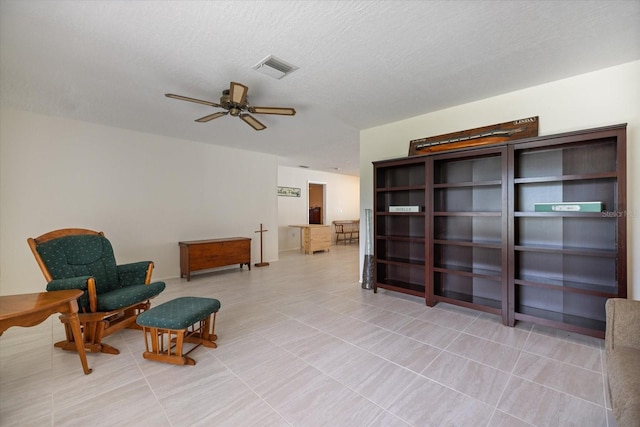 2941 Datura Rd, Venice, FL 34293 - sitting room featuring ceiling fan and tile patterned floors