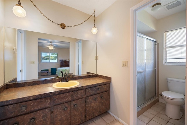 2941 Datura Rd, Venice, FL 34293 - ensuite bathroom featuring tile patterned floors, a stall shower, vanity, and a ceiling fan