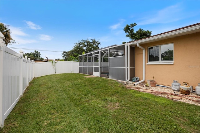 2941 Datura Rd, Venice, FL 34293 - fenced backyard with a lanai