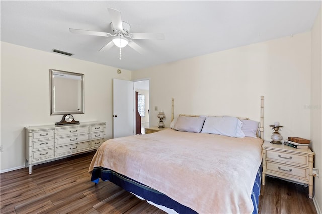 1315 Pine Needle Rd, Venice, FL 34285 - bedroom with dark wood-style flooring and ceiling fan