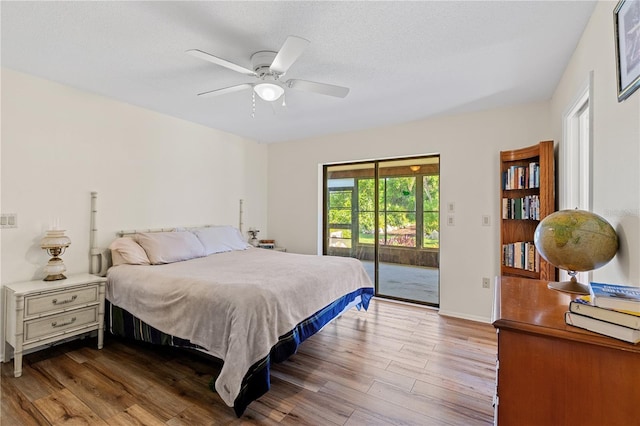 1315 Pine Needle Rd, Venice, FL 34285 - bedroom with access to outside, wood finished floors, and a ceiling fan