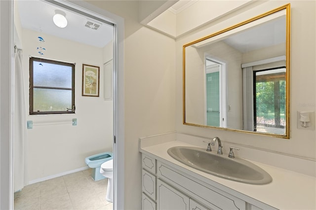 1315 Pine Needle Rd, Venice, FL 34285 - bathroom with vanity, tile patterned flooring, and a bidet