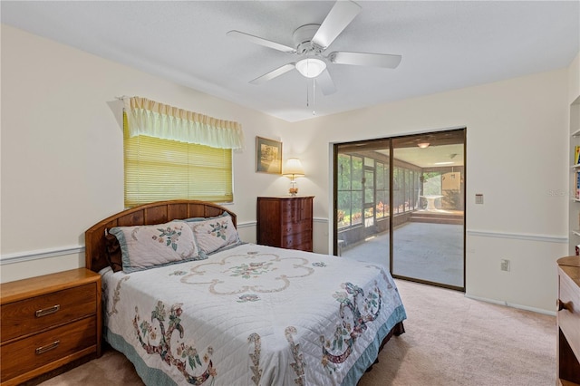 1315 Pine Needle Rd, Venice, FL 34285 - carpeted bedroom with access to exterior and ceiling fan