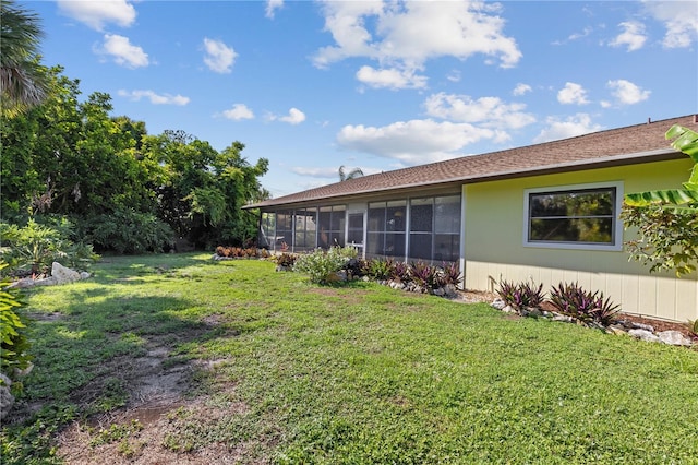 1315 Pine Needle Rd, Venice, FL 34285 - view of green lawn with a sunroom