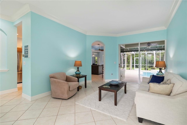6619 Pinefeather Ct, Bradenton, FL 34203 - living area featuring a ceiling fan, crown molding, and light tile patterned floors
