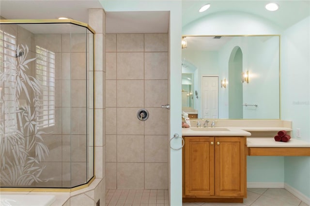 6619 Pinefeather Ct, Bradenton, FL 34203 - full bath featuring tiled shower, vanity, and tile patterned flooring