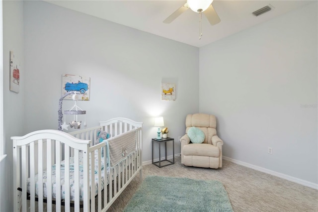 6619 Pinefeather Ct, Bradenton, FL 34203 - bedroom with carpet, a nursery area, and ceiling fan