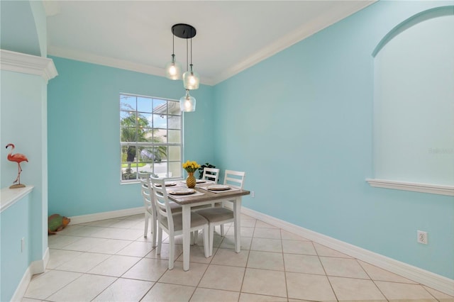 6619 Pinefeather Ct, Bradenton, FL 34203 - dining area featuring light tile patterned flooring and crown molding