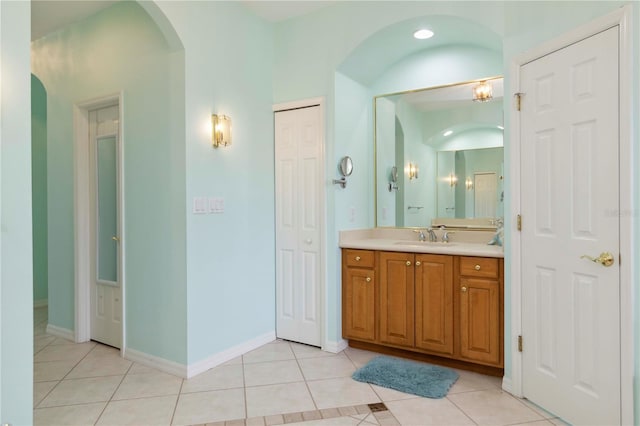 6619 Pinefeather Ct, Bradenton, FL 34203 - bathroom with tile patterned flooring, vanity, and a closet