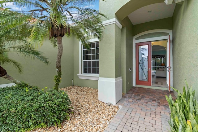 6619 Pinefeather Ct, Bradenton, FL 34203 - doorway to property with stucco siding