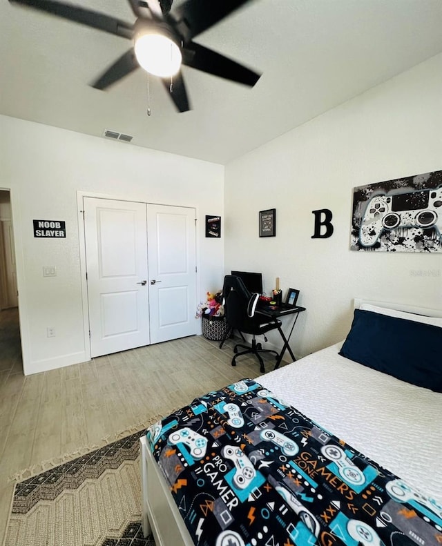 4033 Union Ln, North Port, FL 34288 - bedroom featuring wood finished floors, a closet, and a ceiling fan