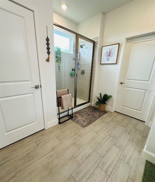 4033 Union Ln, North Port, FL 34288 - full bath featuring a shower stall and wood finished floors