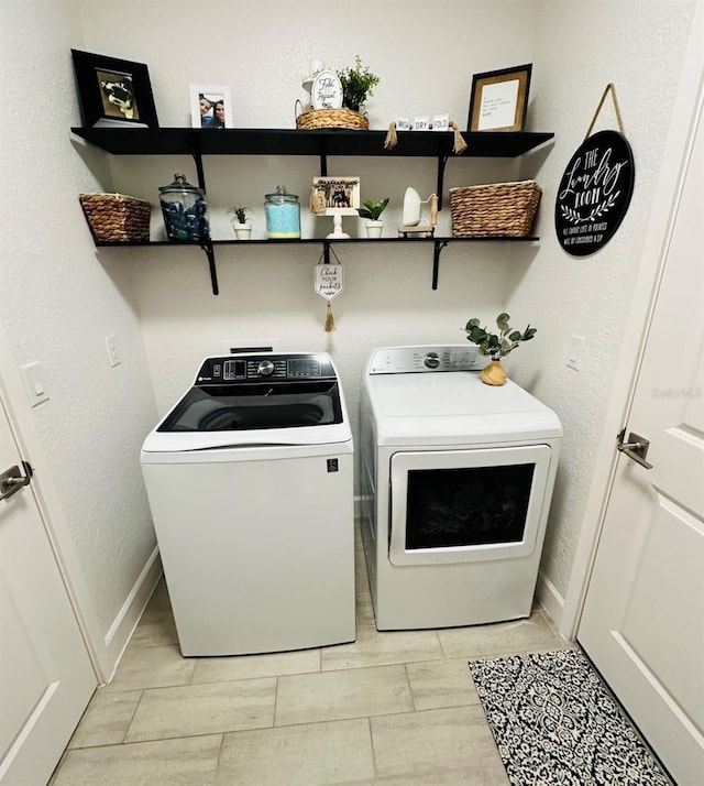 4033 Union Ln, North Port, FL 34288 - washroom with separate washer and dryer and baseboards