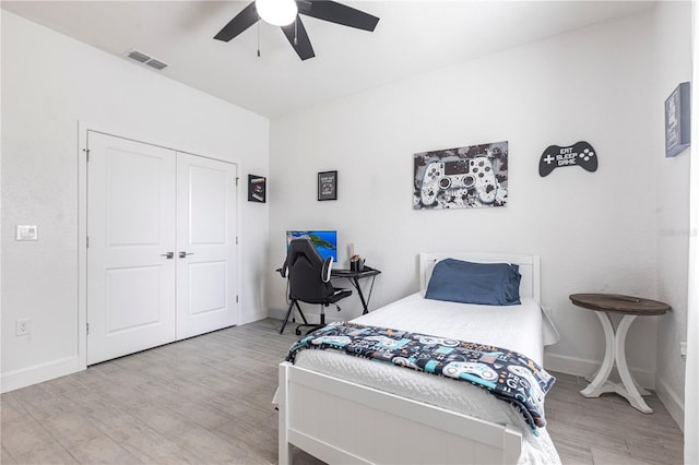 4033 Union Ln, North Port, FL 34288 - bedroom with wood finished floors, a closet, and ceiling fan