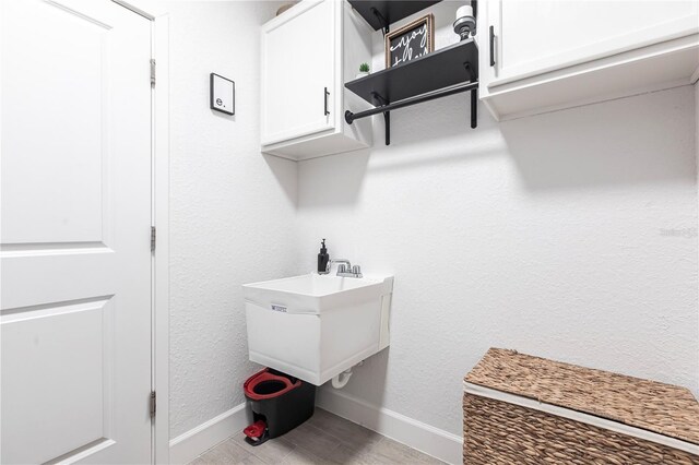 4033 Union Ln, North Port, FL 34288 - laundry room featuring baseboards