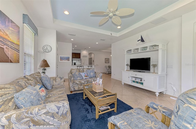 371 Capulet Dr, Venice, FL 34292 - living area featuring a ceiling fan, light tile patterned floors, recessed lighting, and a raised ceiling