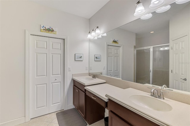 371 Capulet Dr, Venice, FL 34292 - full bathroom featuring double vanity, a shower stall, and tile patterned flooring