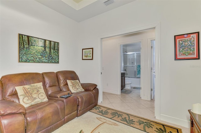 371 Capulet Dr, Venice, FL 34292 - living room featuring light tile patterned floors and baseboards