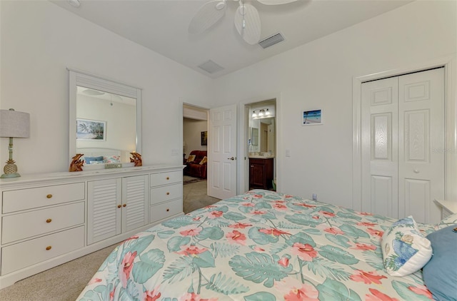 371 Capulet Dr, Venice, FL 34292 - bedroom featuring light carpet, a closet, ensuite bathroom, and ceiling fan