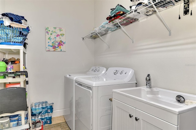 371 Capulet Dr, Venice, FL 34292 - laundry area featuring separate washer and dryer and light tile patterned floors