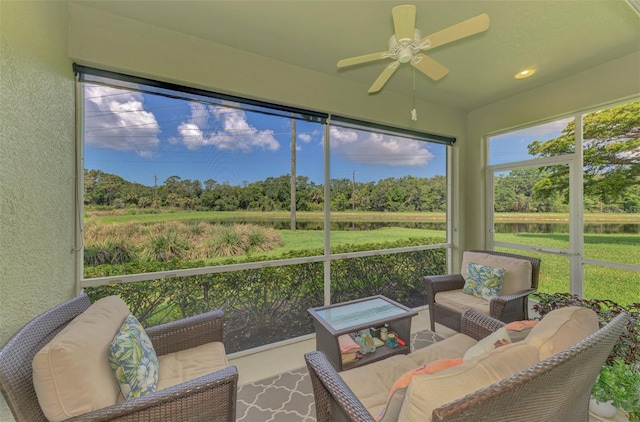 371 Capulet Dr, Venice, FL 34292 - sunroom featuring ceiling fan, a water view, view of scattered trees, and an outdoor hangout area