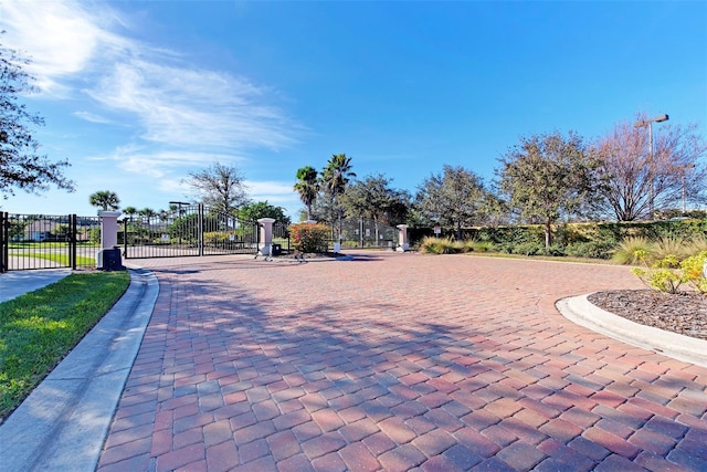 371 Capulet Dr, Venice, FL 34292 - view of home's community featuring a gate