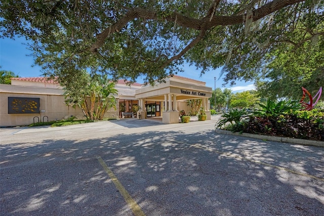 371 Capulet Dr, Venice, FL 34292 - view of front facade featuring stucco siding
