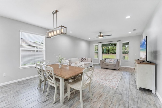 11240 Spring Gate Trl, Bradenton, FL 34211 - dining room featuring light wood-type flooring, a ceiling fan, and recessed lighting
