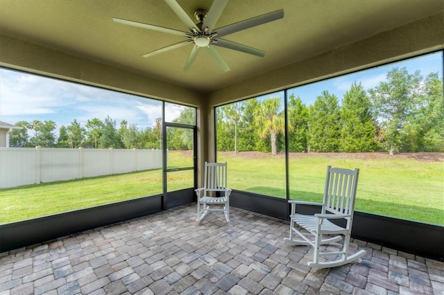 11240 Spring Gate Trl, Bradenton, FL 34211 - sunroom / solarium with ceiling fan and view of wooded area