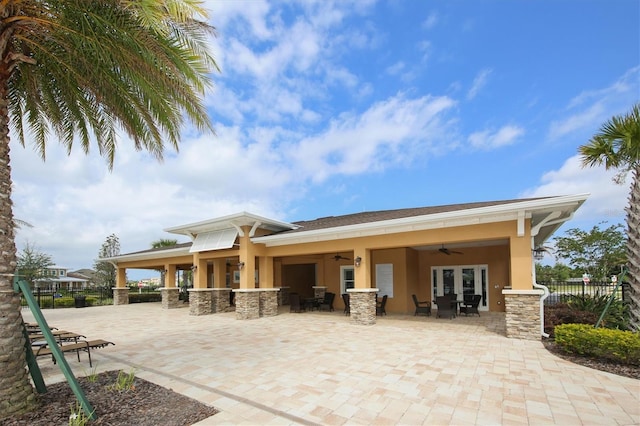 11240 Spring Gate Trl, Bradenton, FL 34211 - rear view of property featuring stucco siding, a ceiling fan, and a patio area