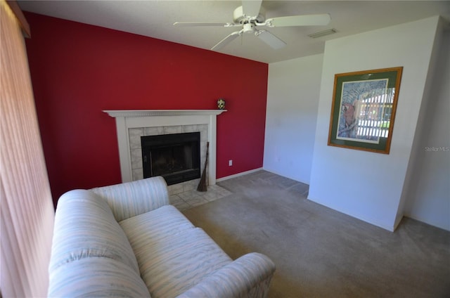 505 Duke Rd, Venice, FL 34293 - living room with a ceiling fan, a tile fireplace, and carpet