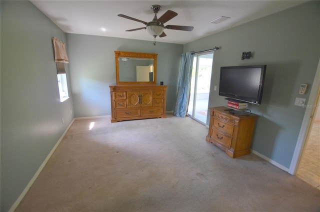 505 Duke Rd, Venice, FL 34293 - bedroom featuring access to exterior, light colored carpet, and a ceiling fan