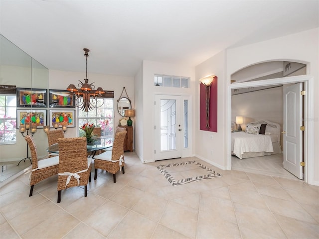 819 Shadow Bay Way, Osprey, FL 34229 - foyer with a chandelier and light tile patterned flooring