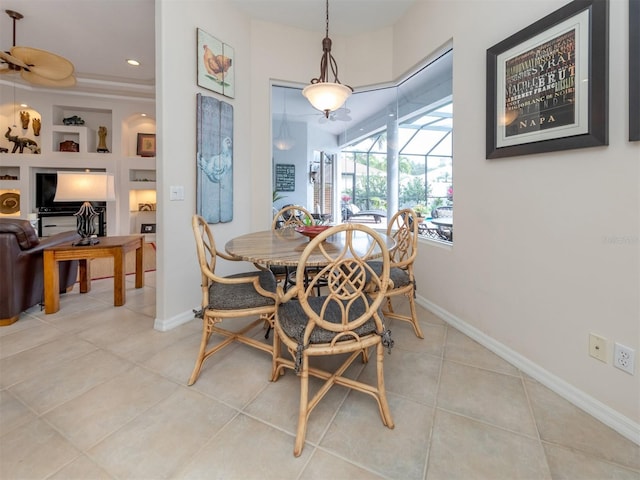 819 Shadow Bay Way, Osprey, FL 34229 - tiled dining room with a sunroom and recessed lighting
