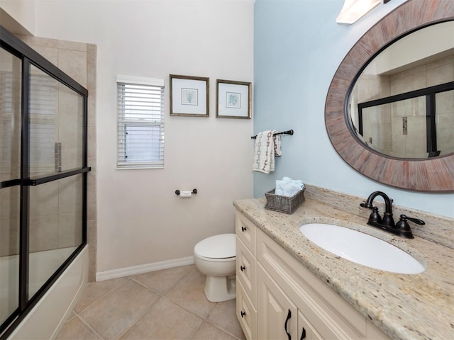 819 Shadow Bay Way, Osprey, FL 34229 - full bathroom with vanity, tile patterned floors, and combined bath / shower with glass door