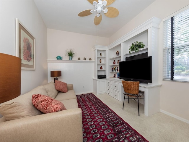 819 Shadow Bay Way, Osprey, FL 34229 - living room with a ceiling fan, light colored carpet, and a desk