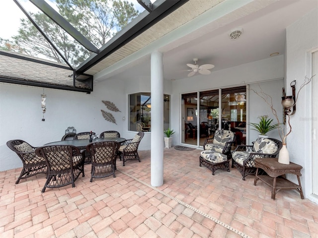 819 Shadow Bay Way, Osprey, FL 34229 - view of patio / terrace featuring ceiling fan, outdoor dining space, and glass enclosure