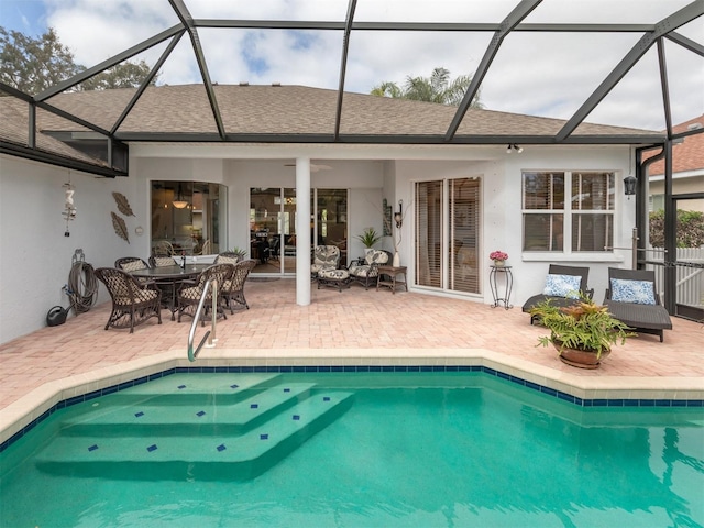 819 Shadow Bay Way, Osprey, FL 34229 - swimming pool with a patio, a lanai, outdoor dining space, and ceiling fan
