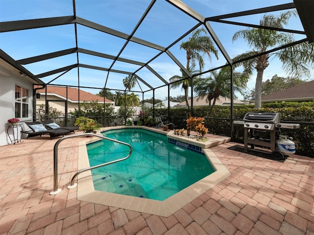 819 Shadow Bay Way, Osprey, FL 34229 - swimming pool with a patio, a grill, and a lanai