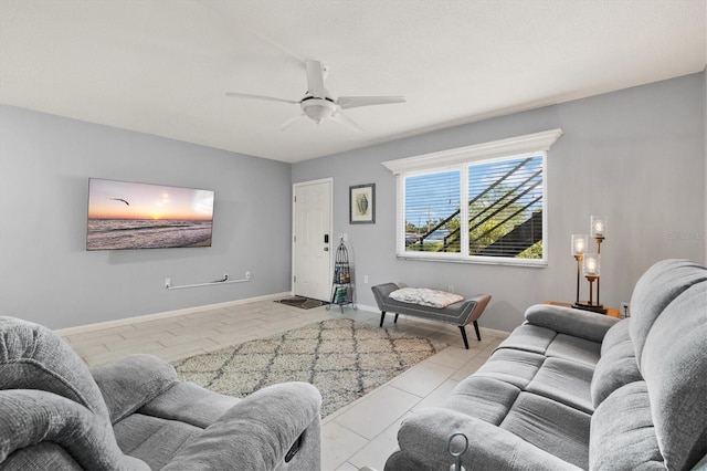 614 Guild Dr Unit 10, Venice, FL 34285 - living area featuring ceiling fan and baseboards